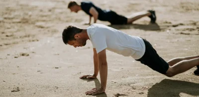 man exercise on beach