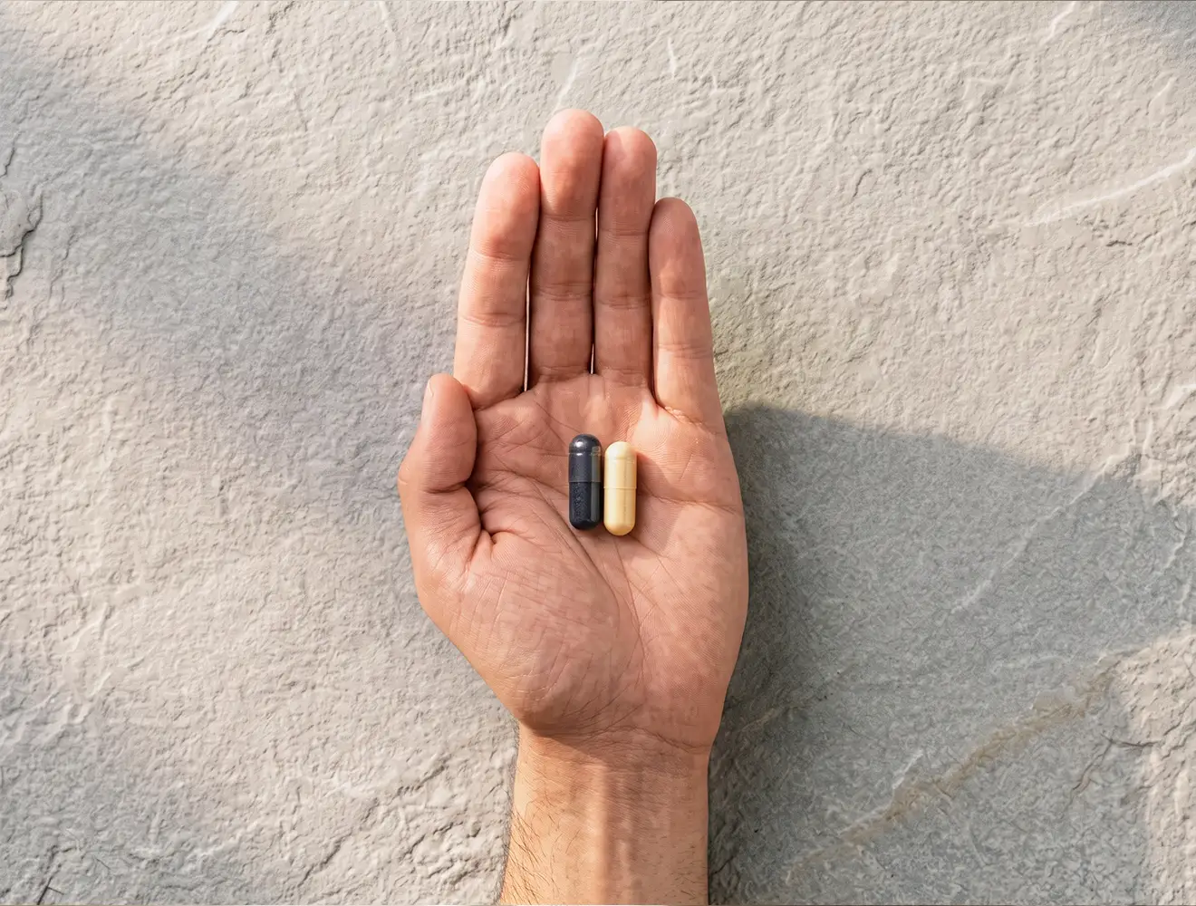 Neem 1 capsule Purovitalis liposomaal NAD en 1 capsule Purovitalis liposomaal Spermidine.