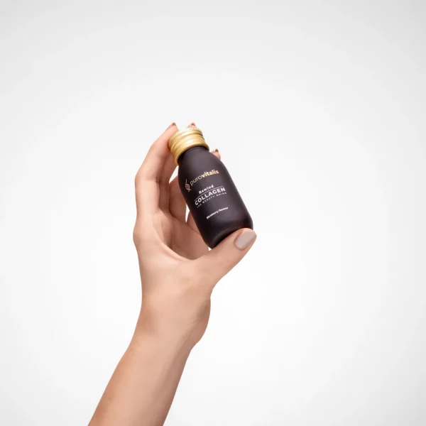Rewind Liquid Collagen bottle held in a hand